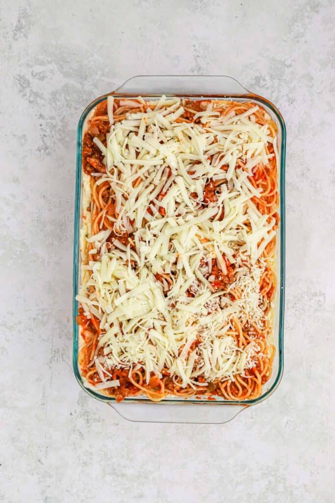 Baked spaghetti in a baking dish before baking