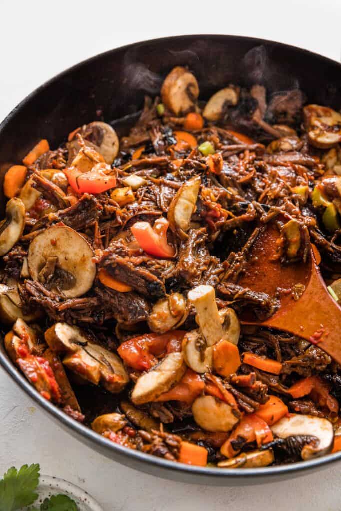 close up of cooked steak and ale pot pie mix