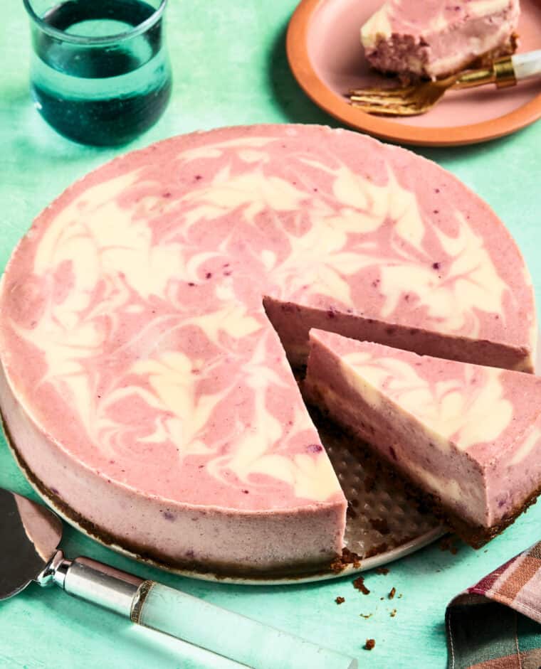 Purple Rain Cheesecake on a springform pan bottom.