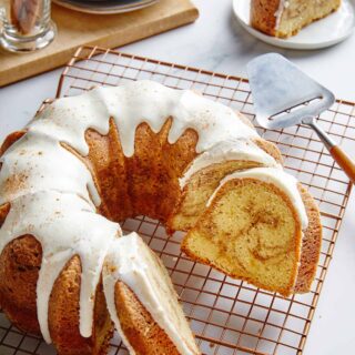 Cinnamon Roll Pound Cake sliced on a wire rack