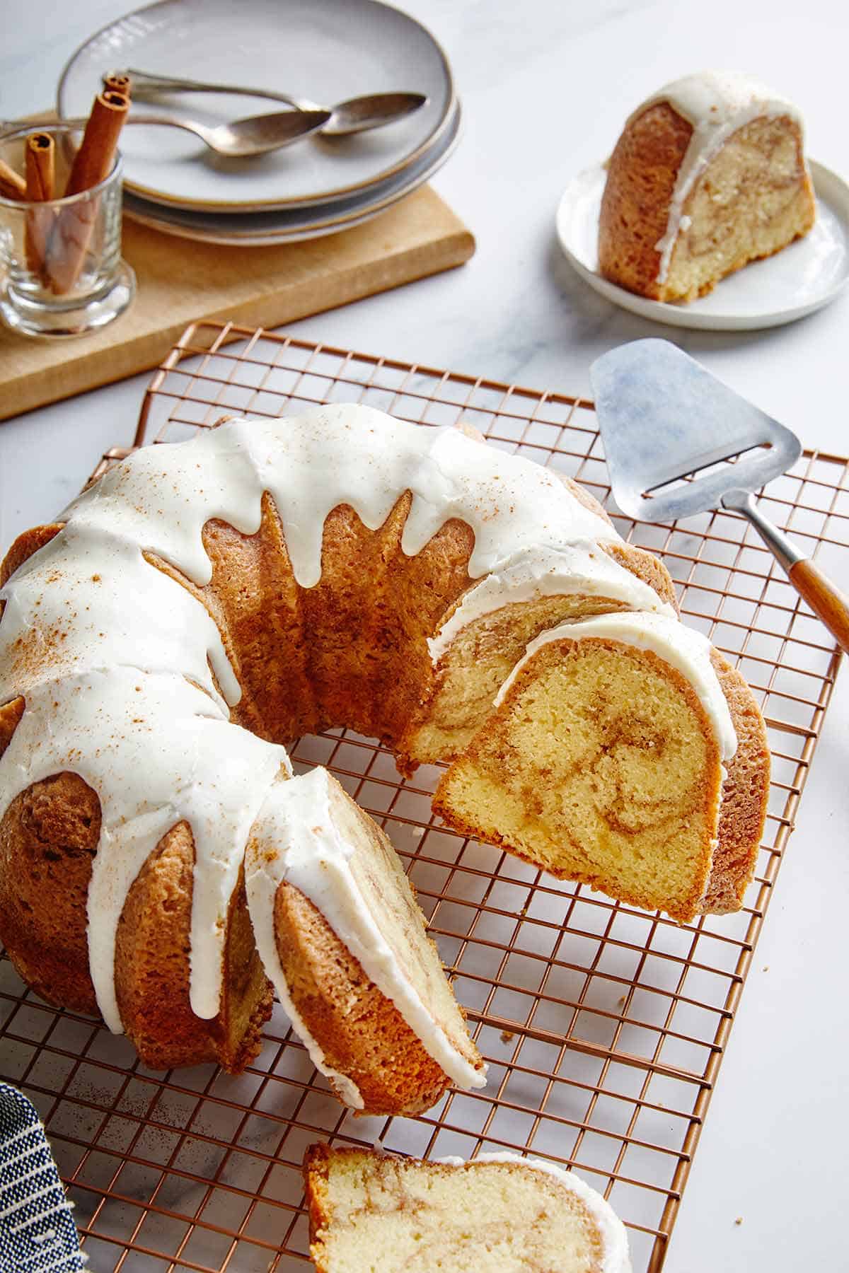 Cinnamon Roll Pound Cake sliced on a wire rack