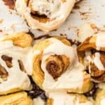 Puff pastry rolls after being baked and covered in glaze ready to serve