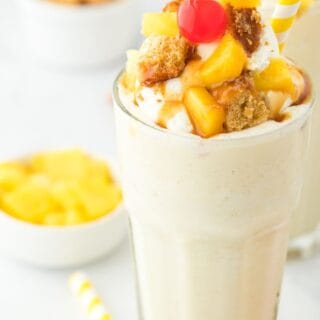 pineapple upside down milkshakes on a white background