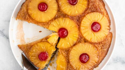 https://grandbaby-cakes.com/wp-content/uploads/2023/04/pineapple-upside-down-cake-featured-480x270.jpg