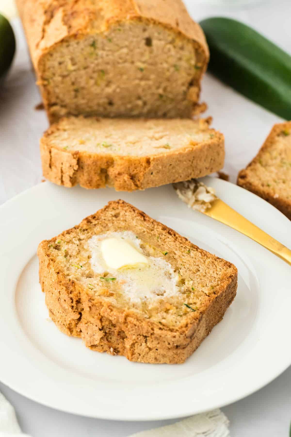 An overhead image of zucchini bread loaf slices ready to serve