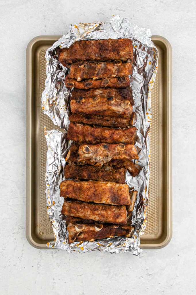 Rib tips being baked in foil for a long period of time