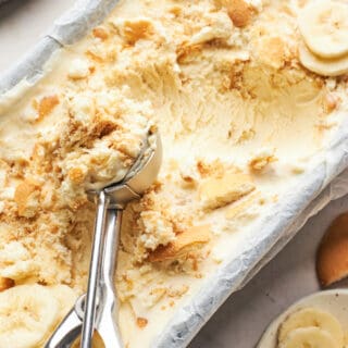 Banana pudding ice cream being scooped to serve