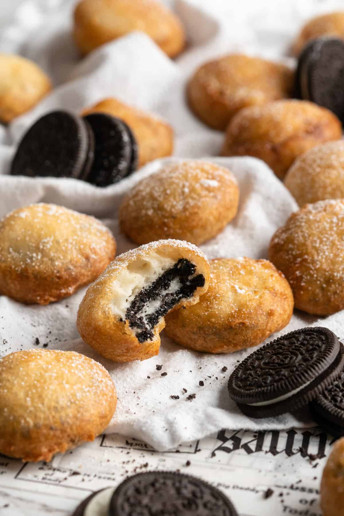 Fried oreos with one bitten into 