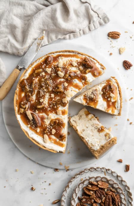 Top view of a pecan pie ice cream pie being sliced.