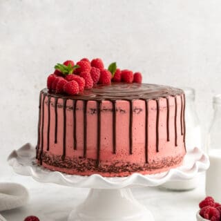 chocolate raspberry cake with a raspberry buttercream and a dark chocolate ganache on top