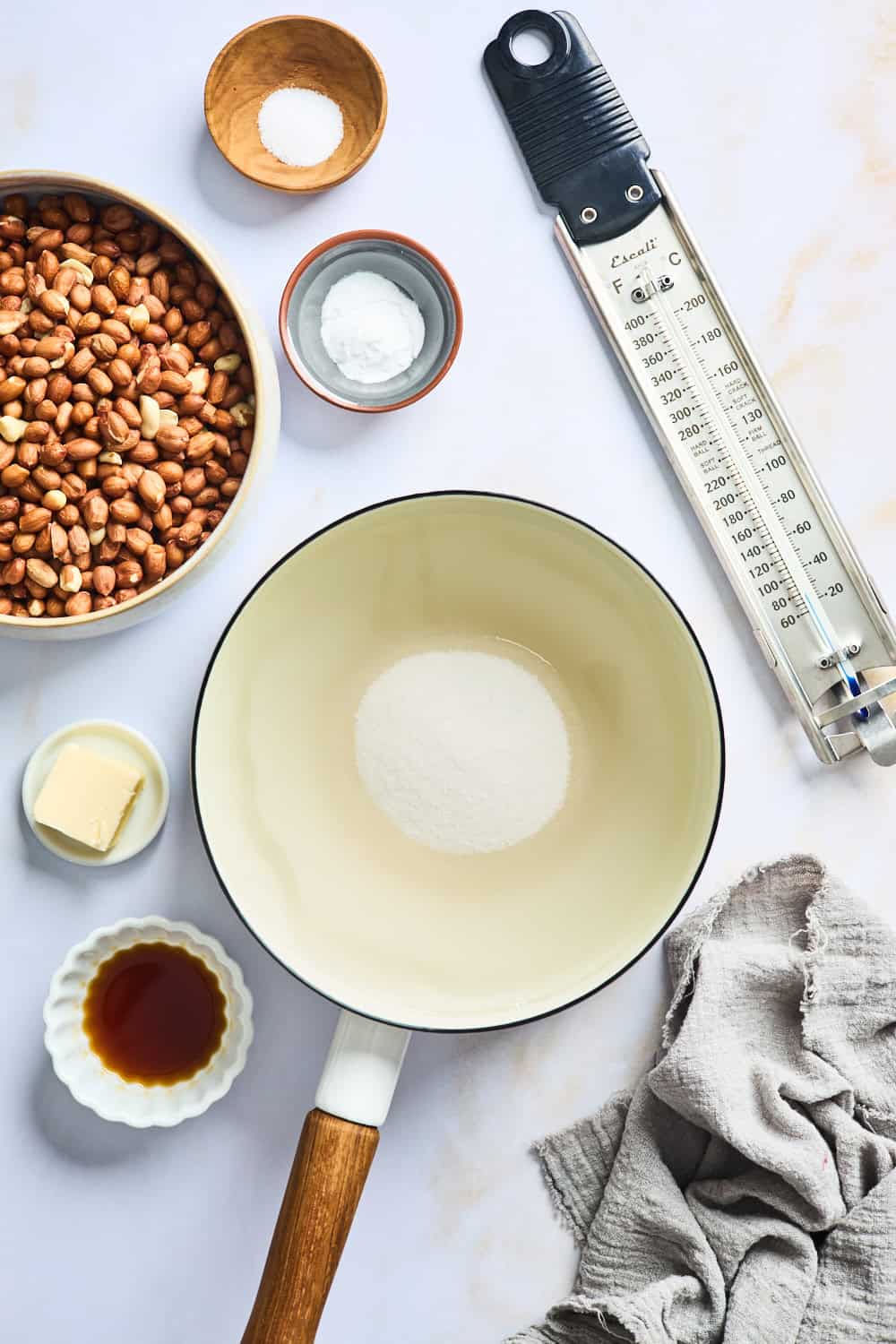 Sugar, corn syrup and water in a large saucepan heating