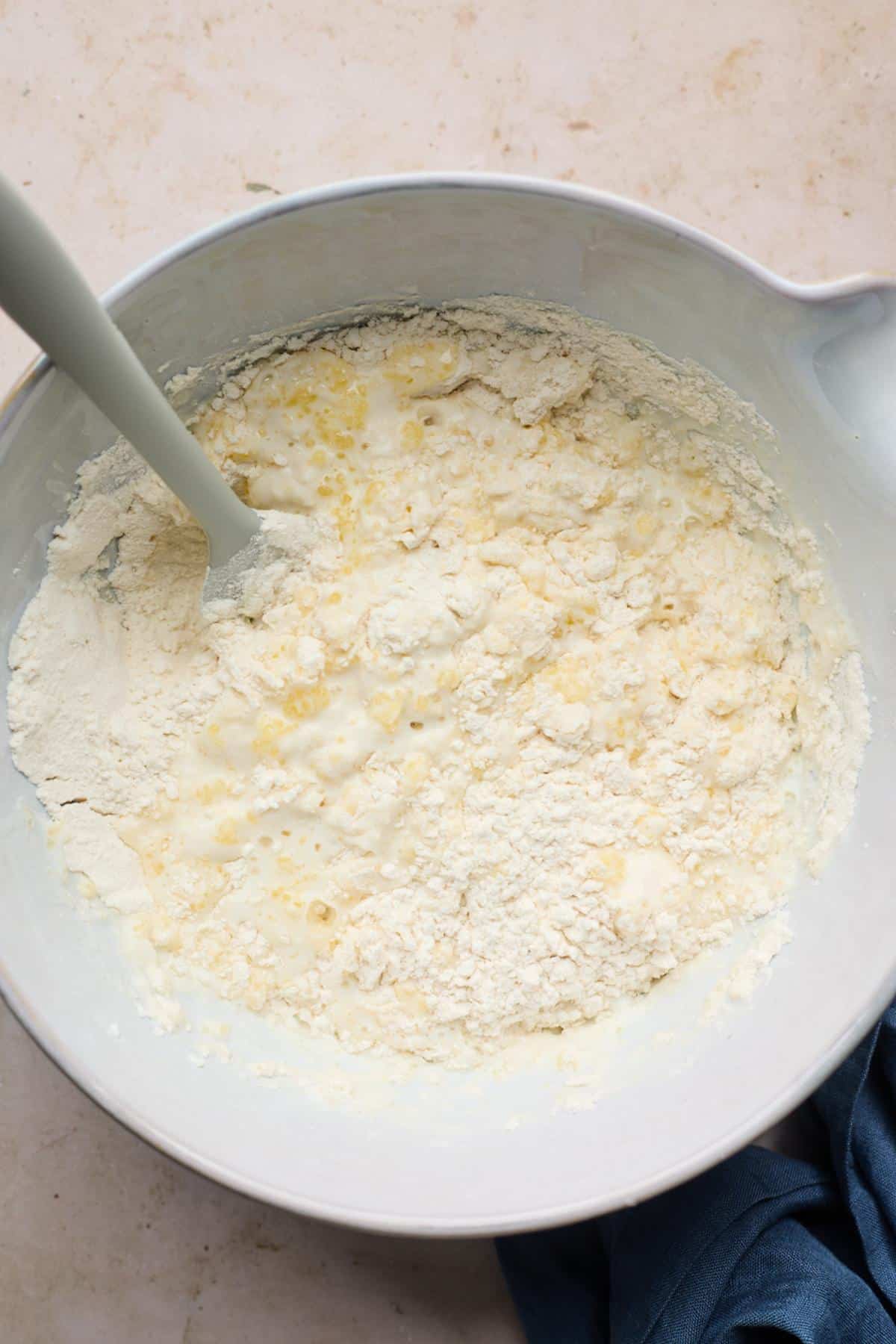 Wet and dry ingredients combined in mixing bowl