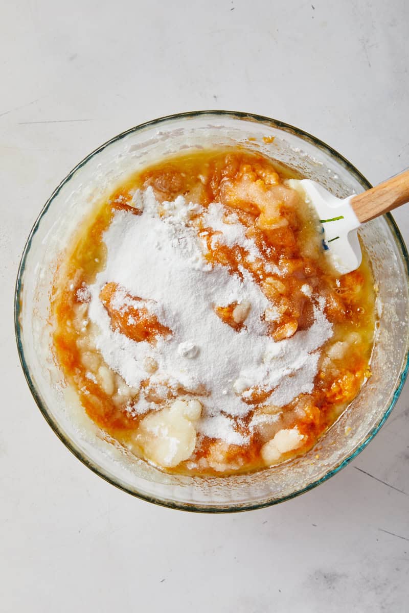 Sugar, corn syrup in clear bowl of mashed sweet potatoes