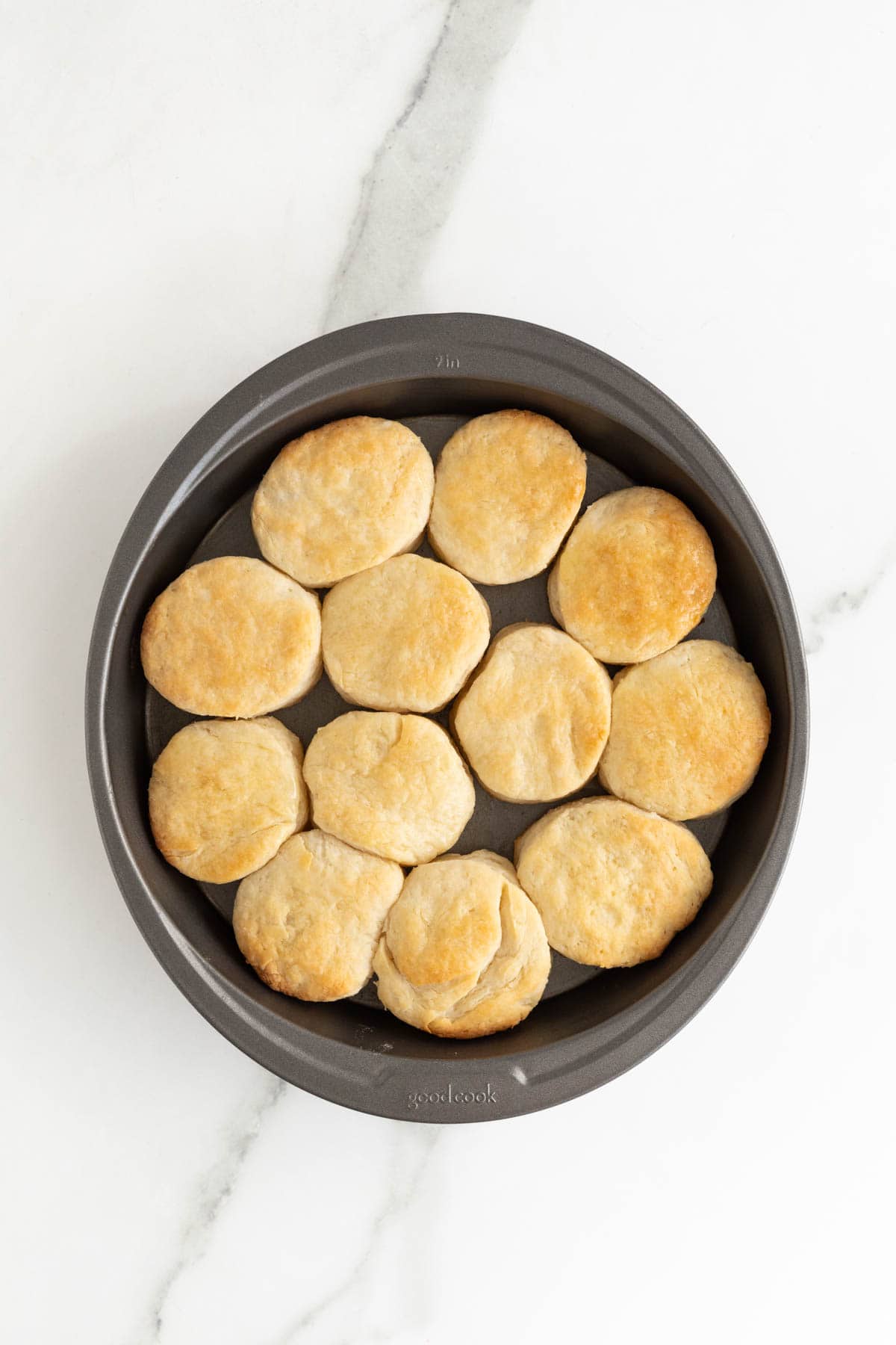 A pan of buttermilk biscuit recipe baked before serving