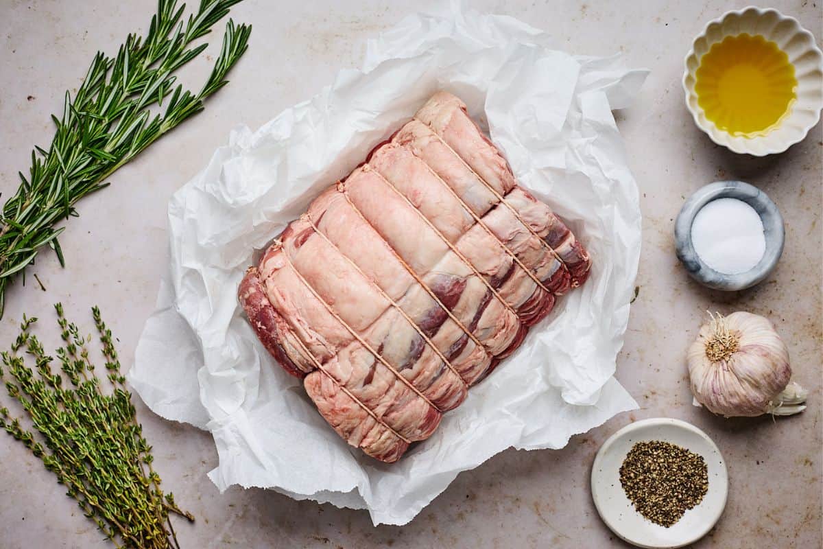 Overhead shot of ingredients to make prime rib on the table before roasting