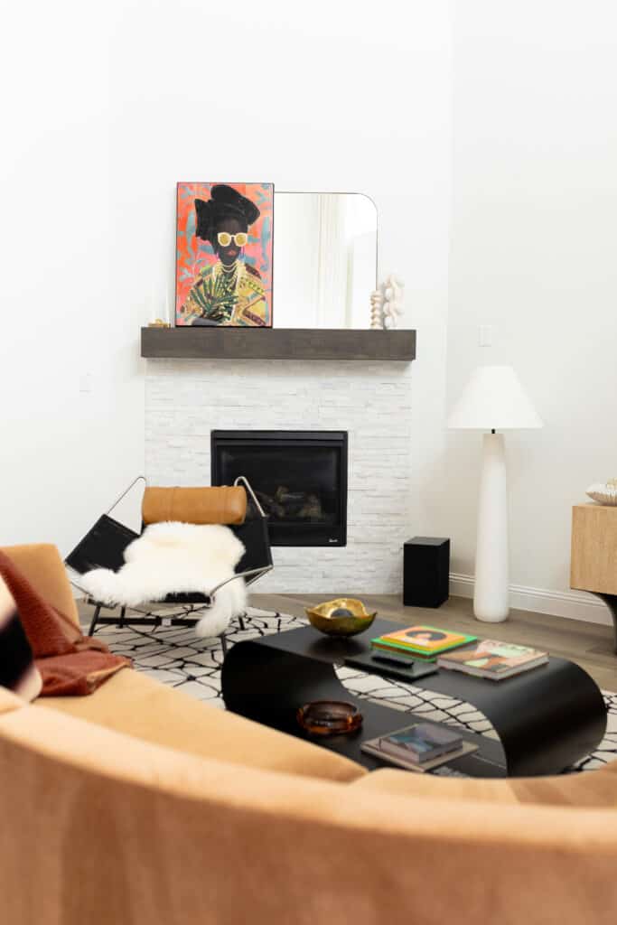 A shot at the fireplace and art in Jocelyn's living space