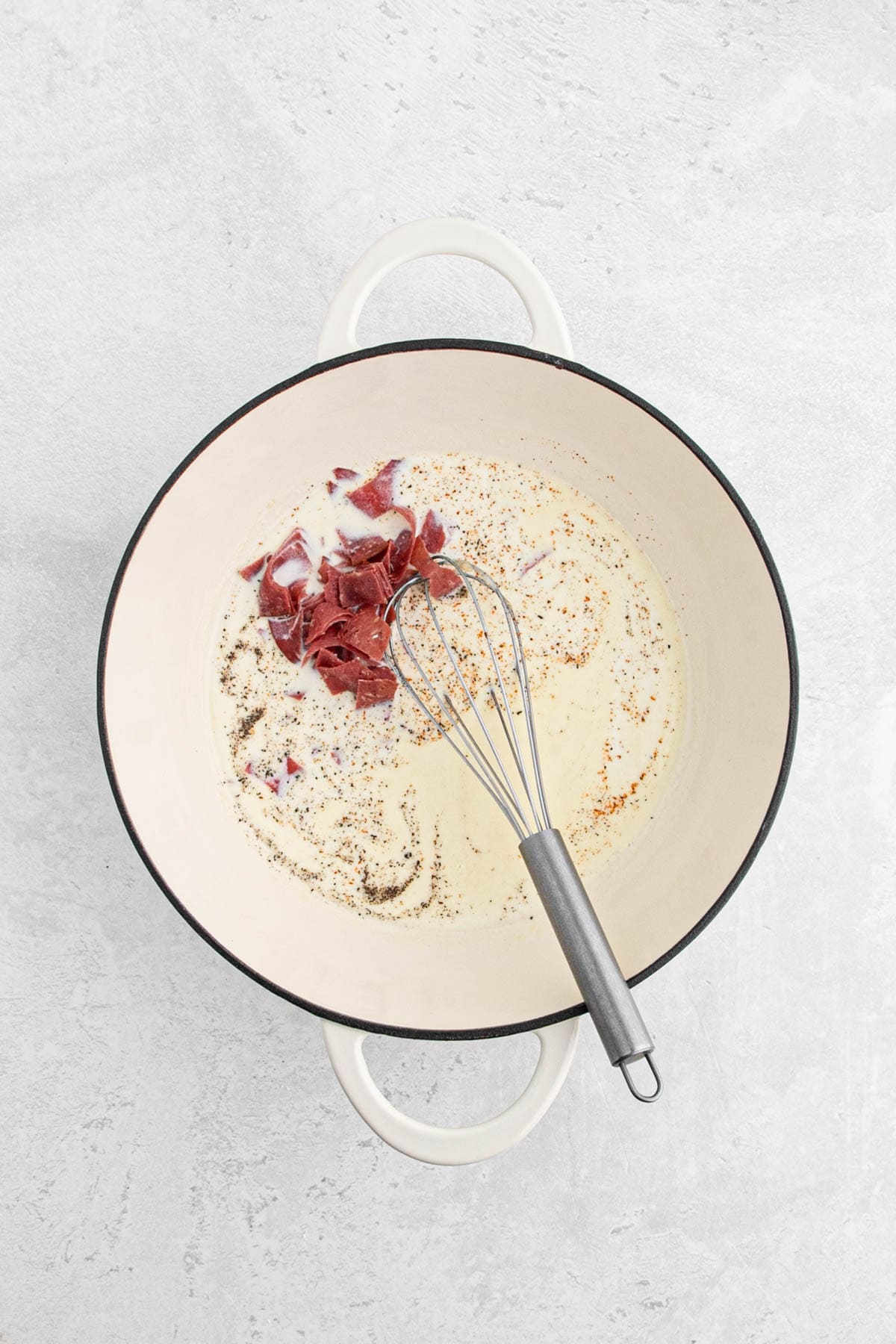 Sliced chipped beef and black pepper added to the creamy sauce