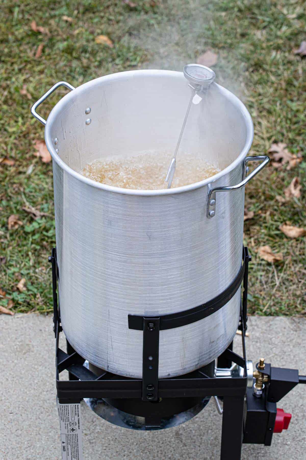 Turkey frying on a frying pot