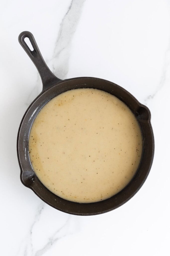 Thickened gravy being cooked