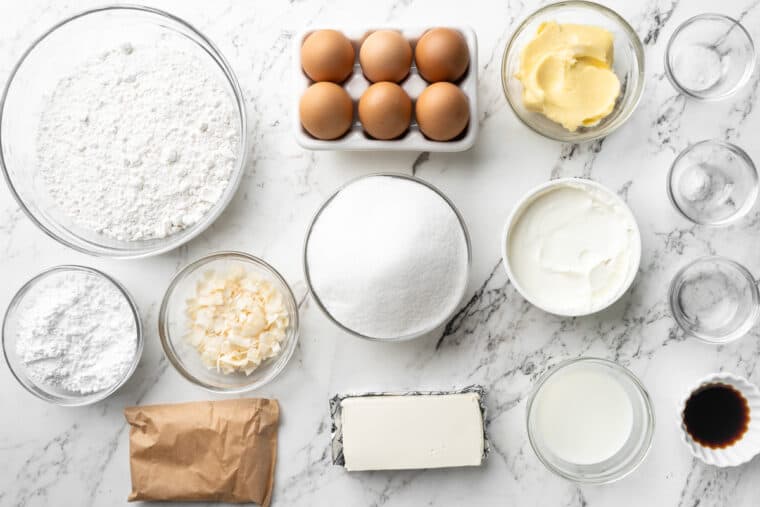 Ingredients in glass bowls on white countertop