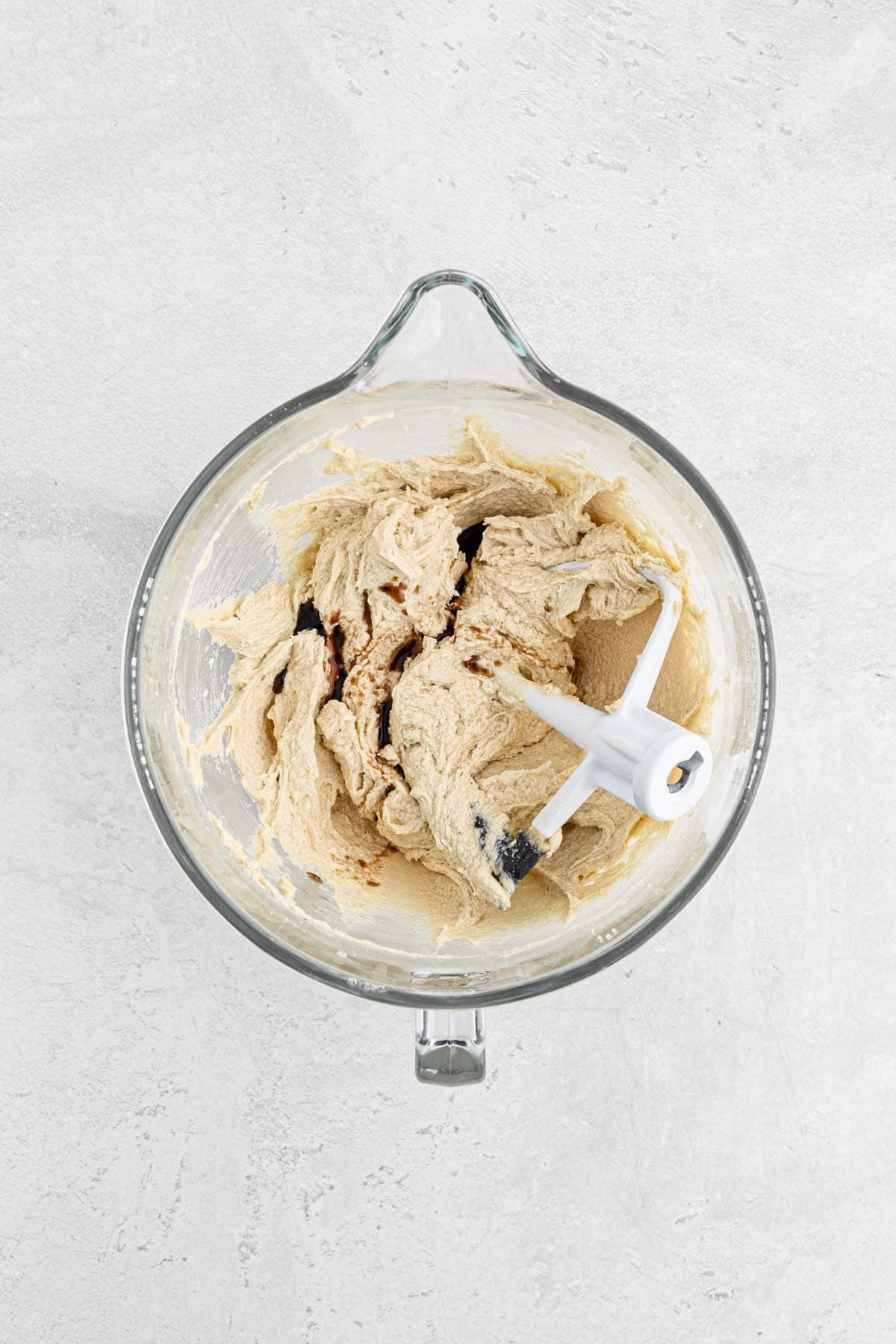 Partially mixed cookie dough in a stand mixer