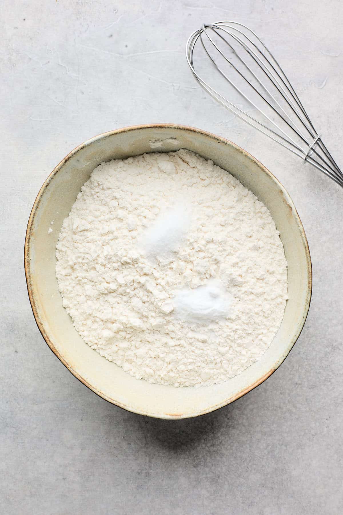 Flour, salt and baking soda in a large mixing bowl with a whisk