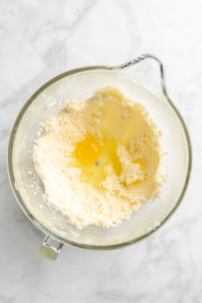Butter and sugar creamed in a mixing bowl with egg added