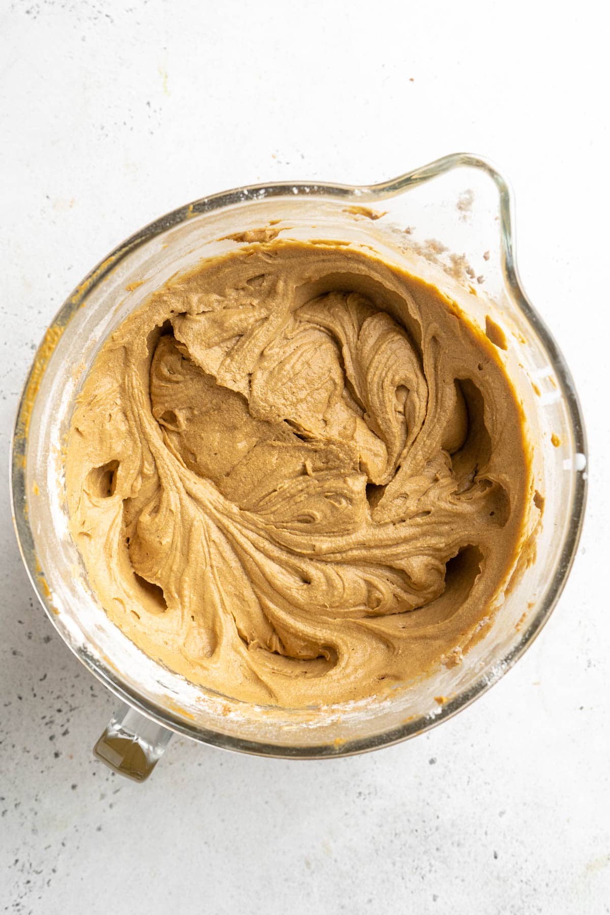 Fully mixed gingerbread batter in a mixing bowl