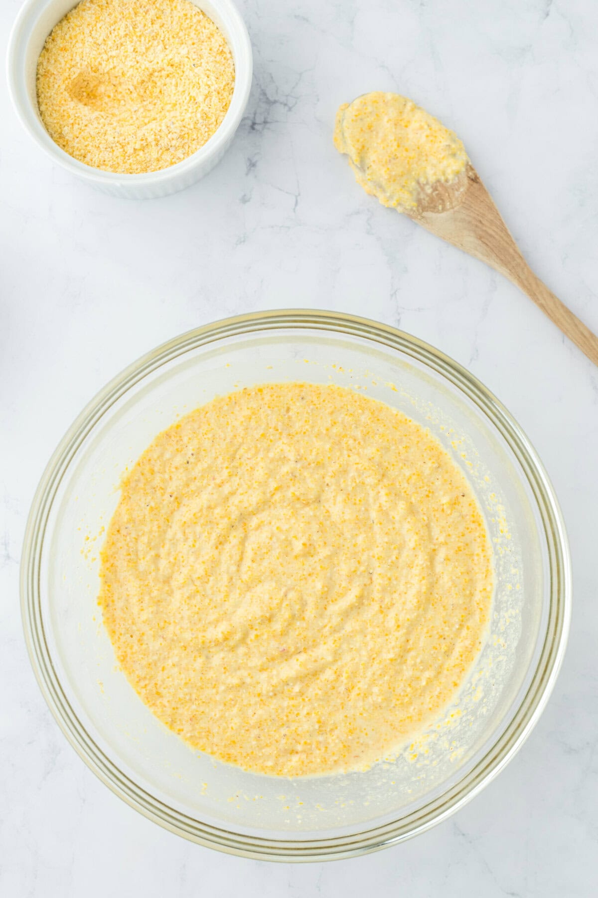 Completed fried cornbread batter in glass bowl