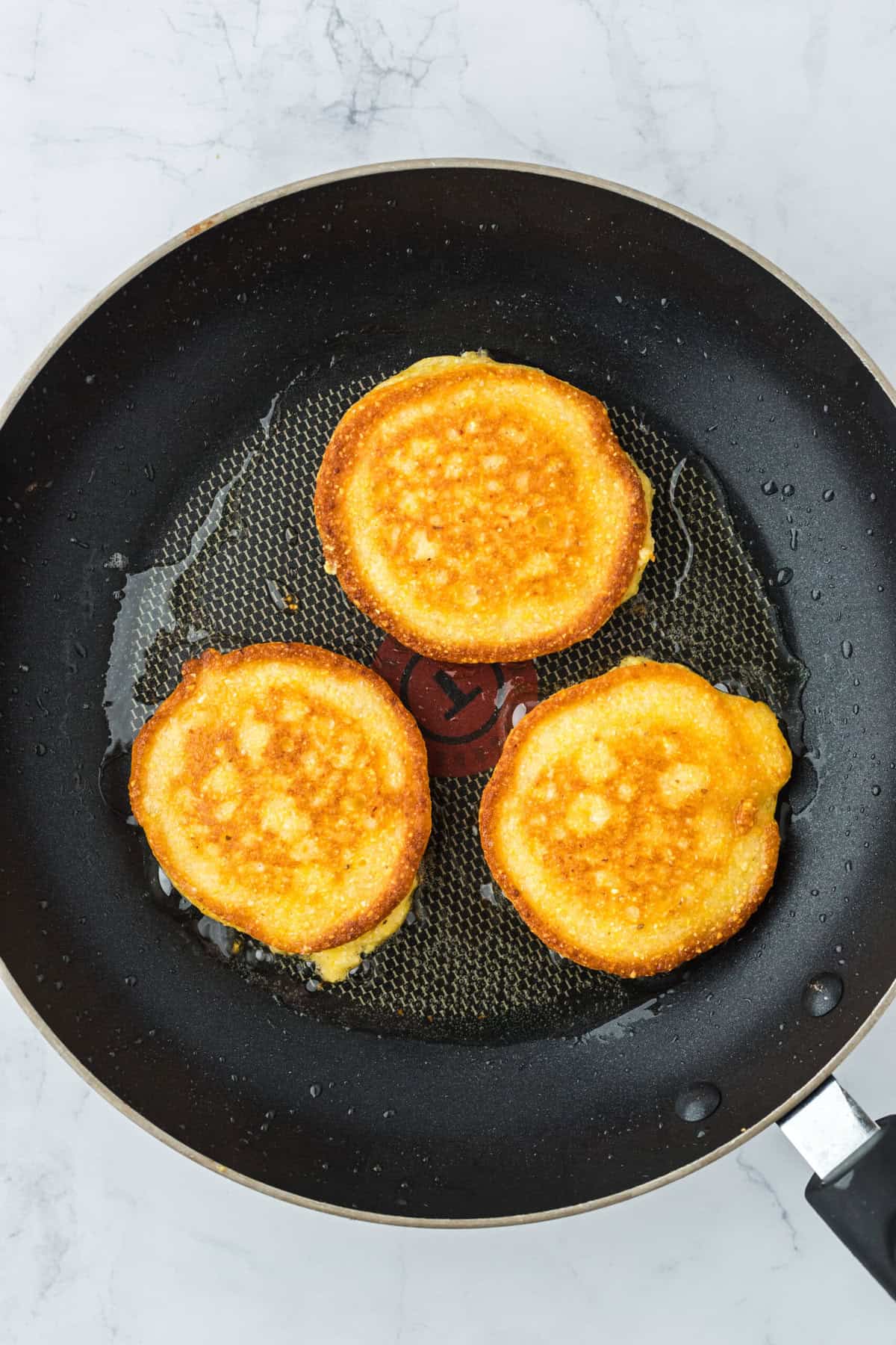 Fried cornbread in a skillet