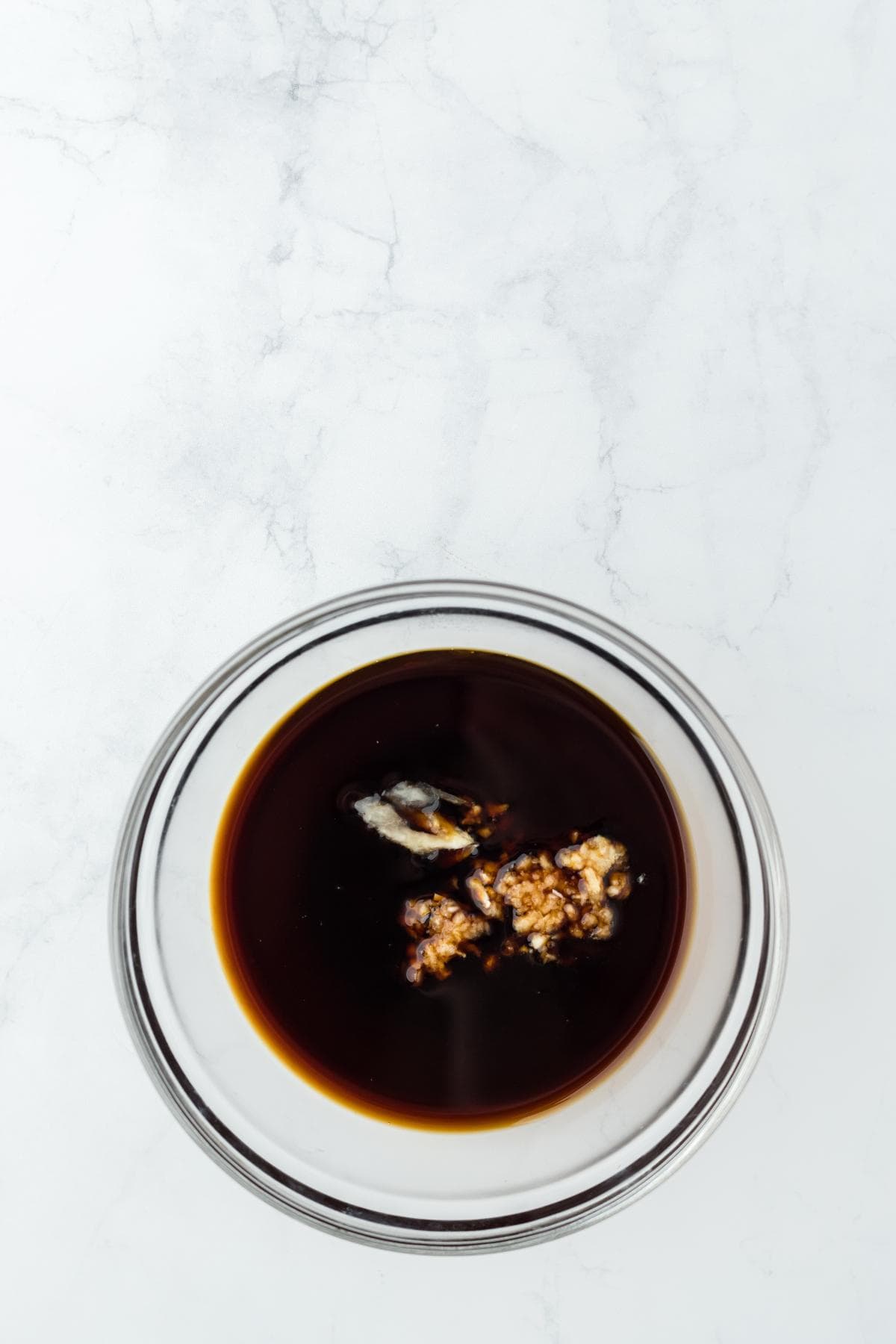 Bowl of soy sauce with the rest of the glaze ingredients