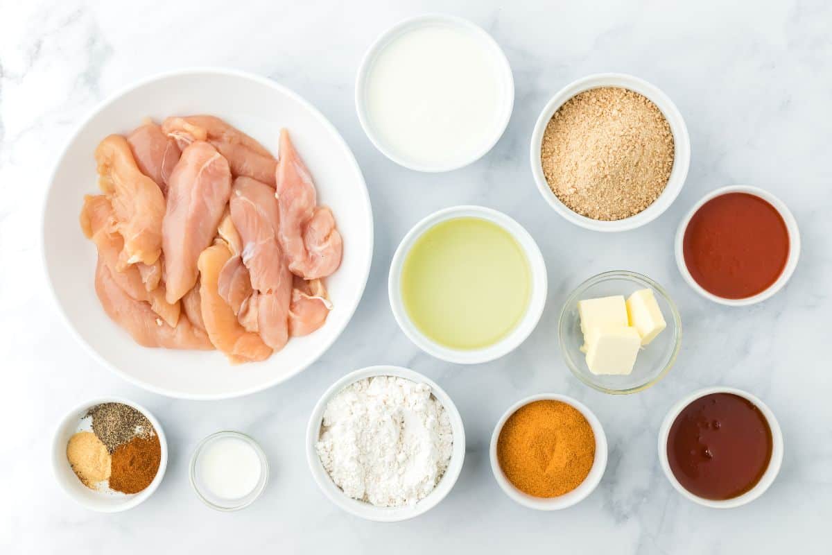 Overhead shot of ingredients to make hot honey chicken on the table before mixing and cooking