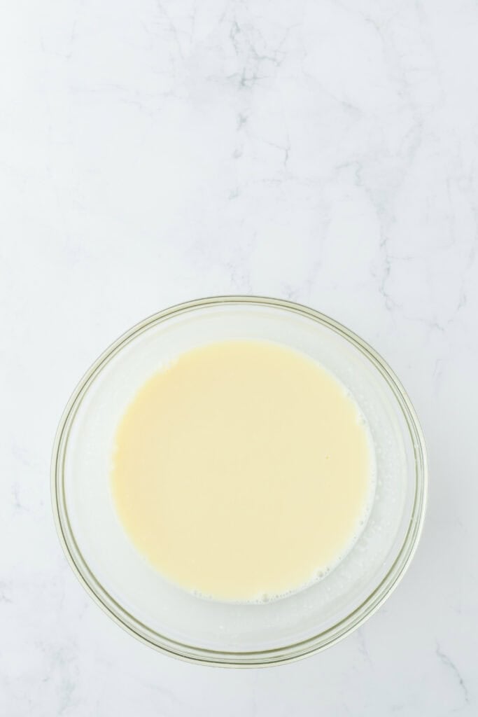 White chocolate sauce in a glass bowl
