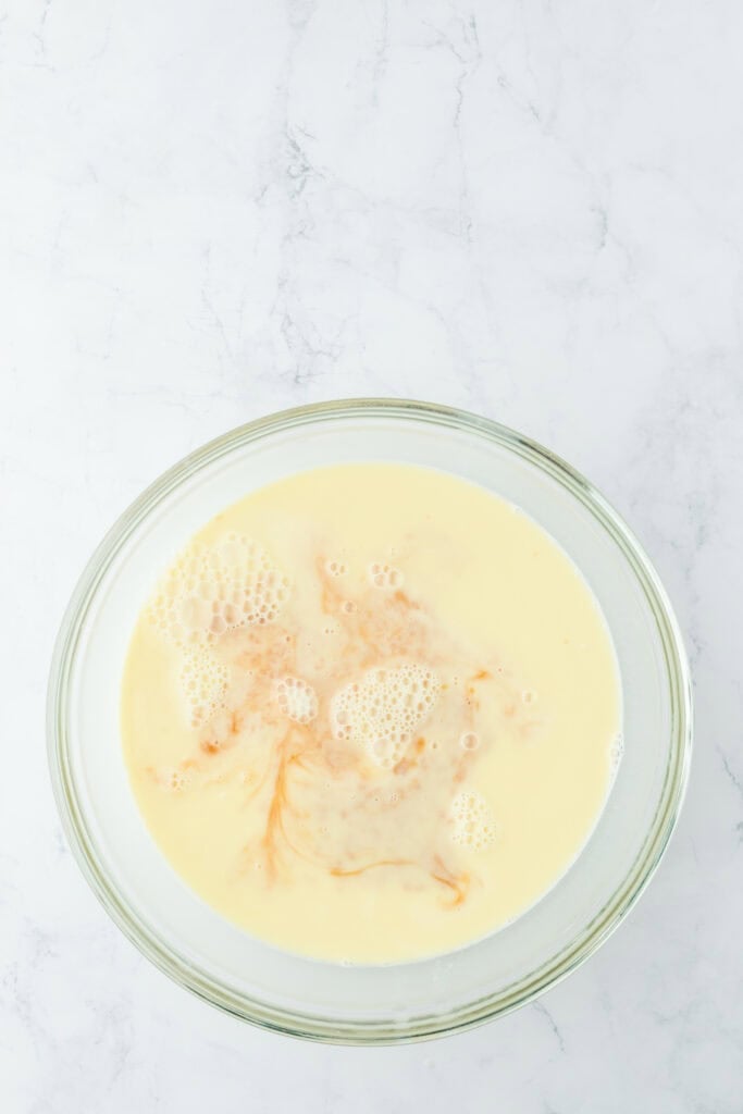 Vanilla, sugar and salt added to hot milk liquid