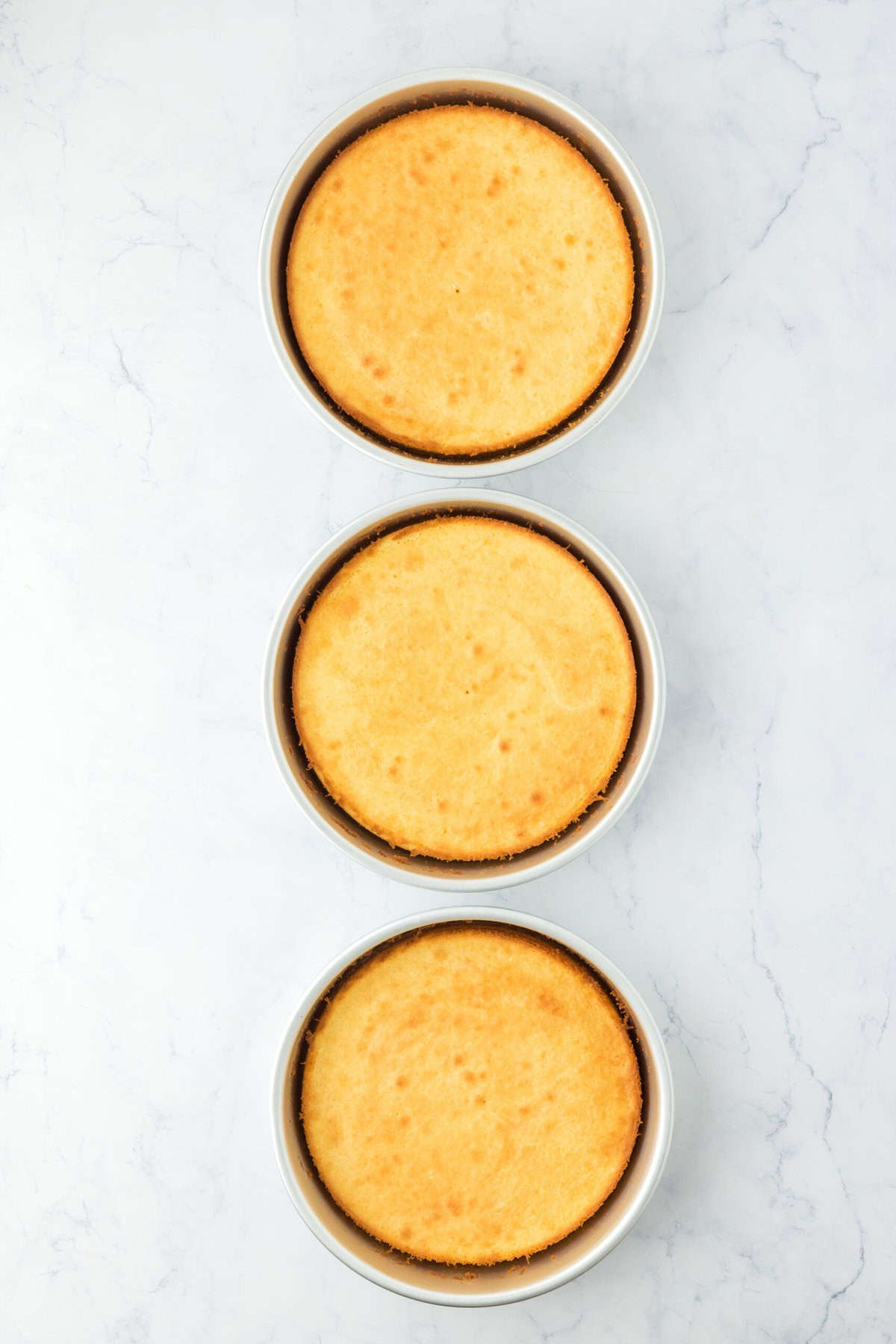 Baked cake layers before icing with caramel