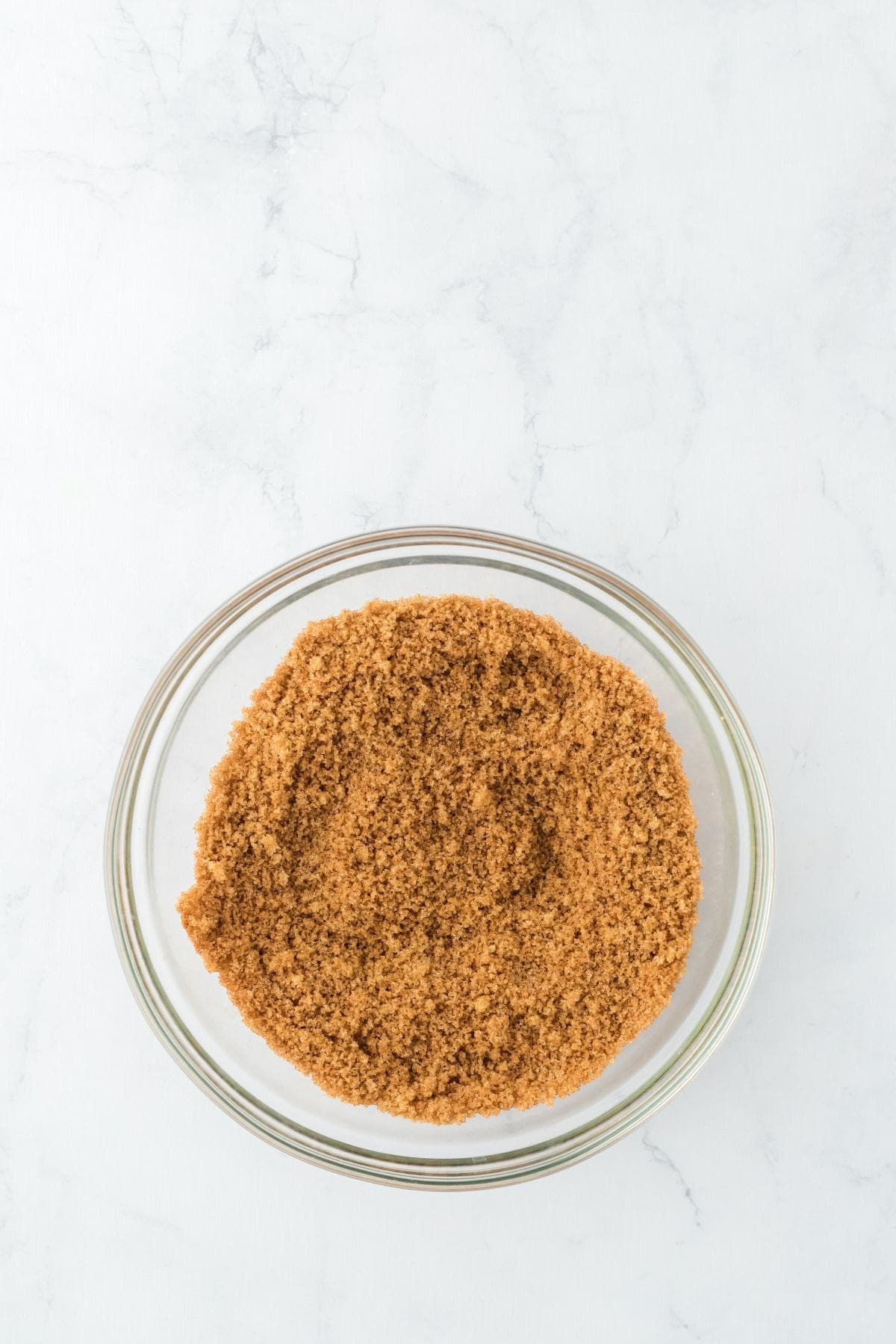 Brown sugar cinnamon mixture in glass bowl