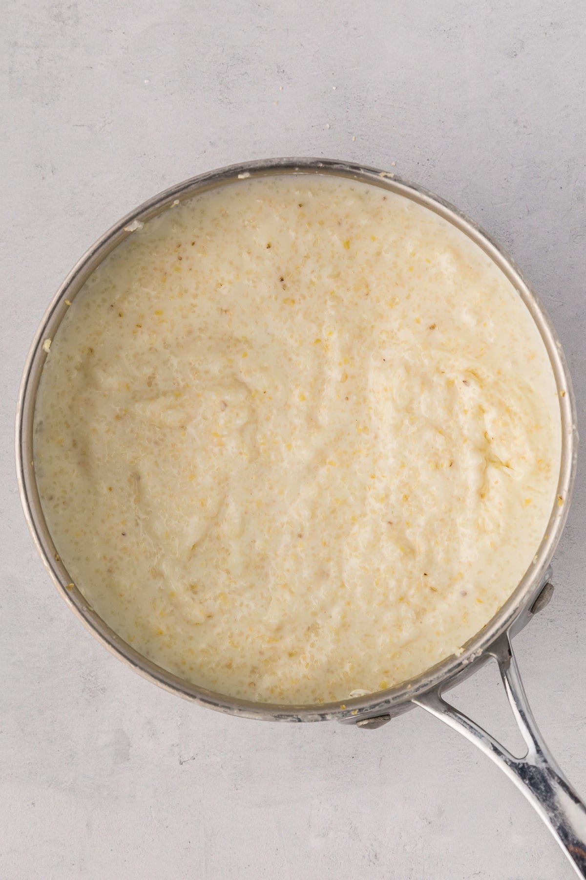 Thick, creamy grits finished cooking in the pot