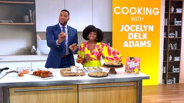 A picture of Jocelyn Delk Adams with Michael Strahan on Good Morning America