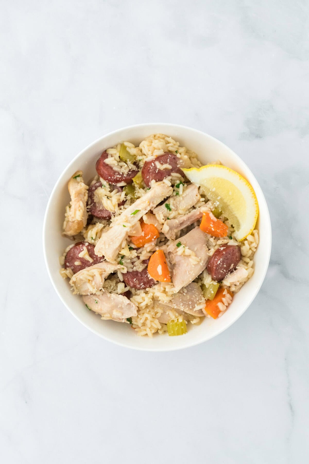 Chicken bog in a white bowl on a white background