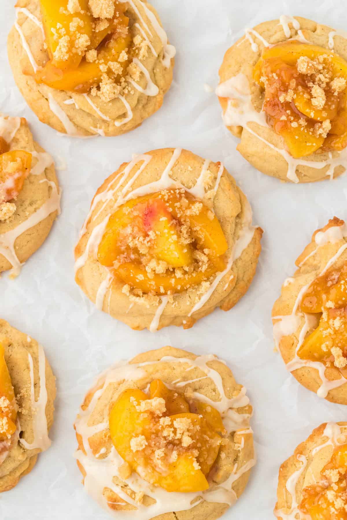 Peach cookies overhead on a white background ready to eat