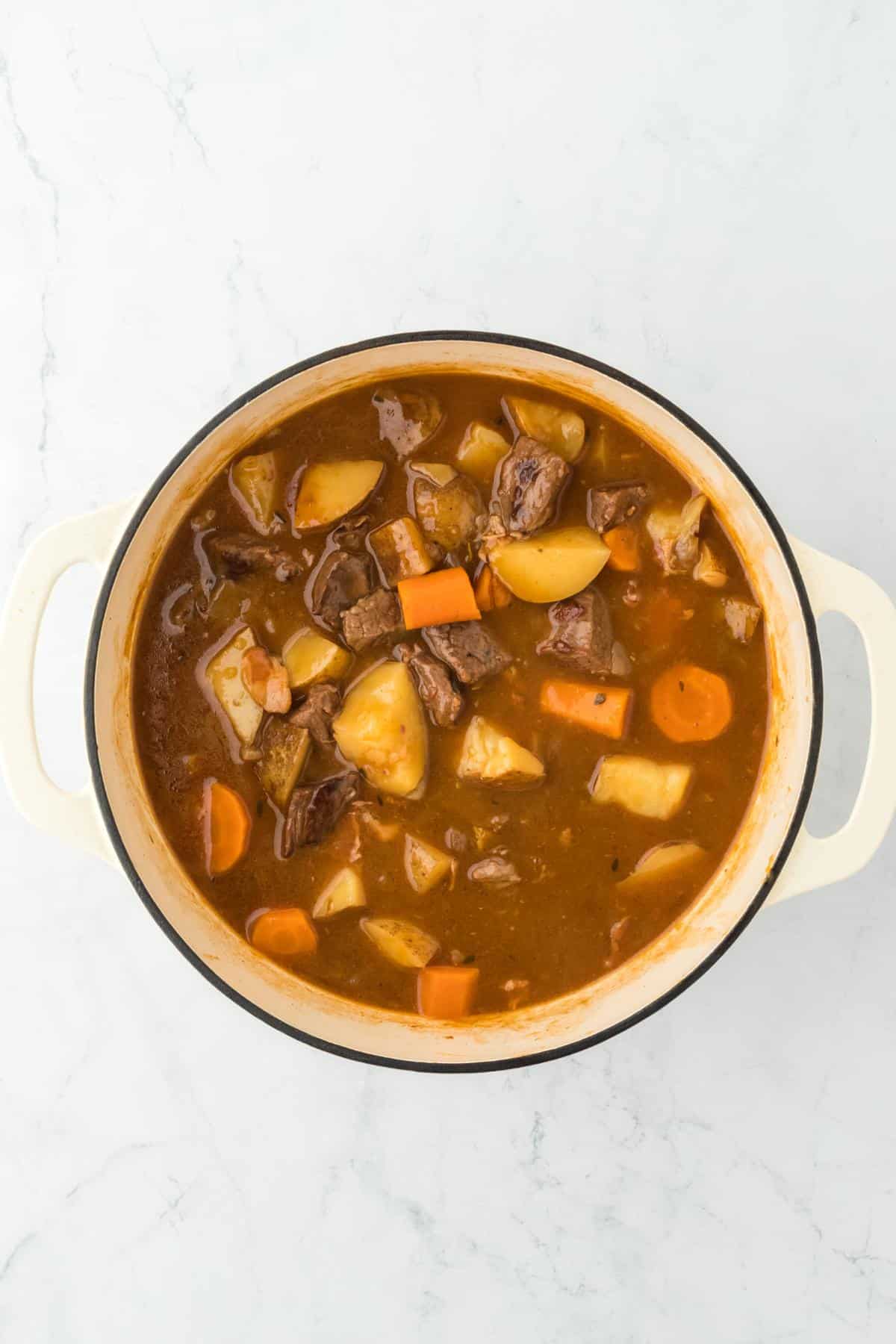 Finished beef stew thickened and rich, with vegetables and tender beef in sauce