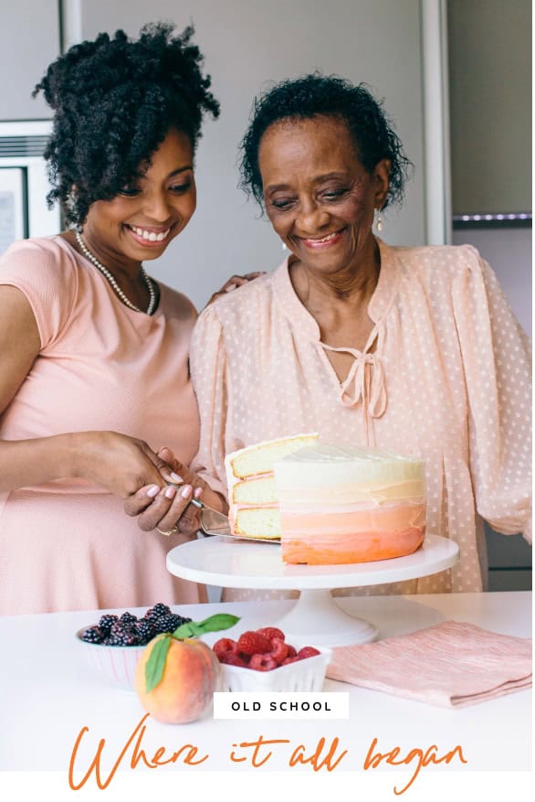 Jocelyn cutting a cake with her mother