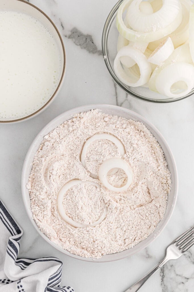 Sliced onions in a spiced cornmeal