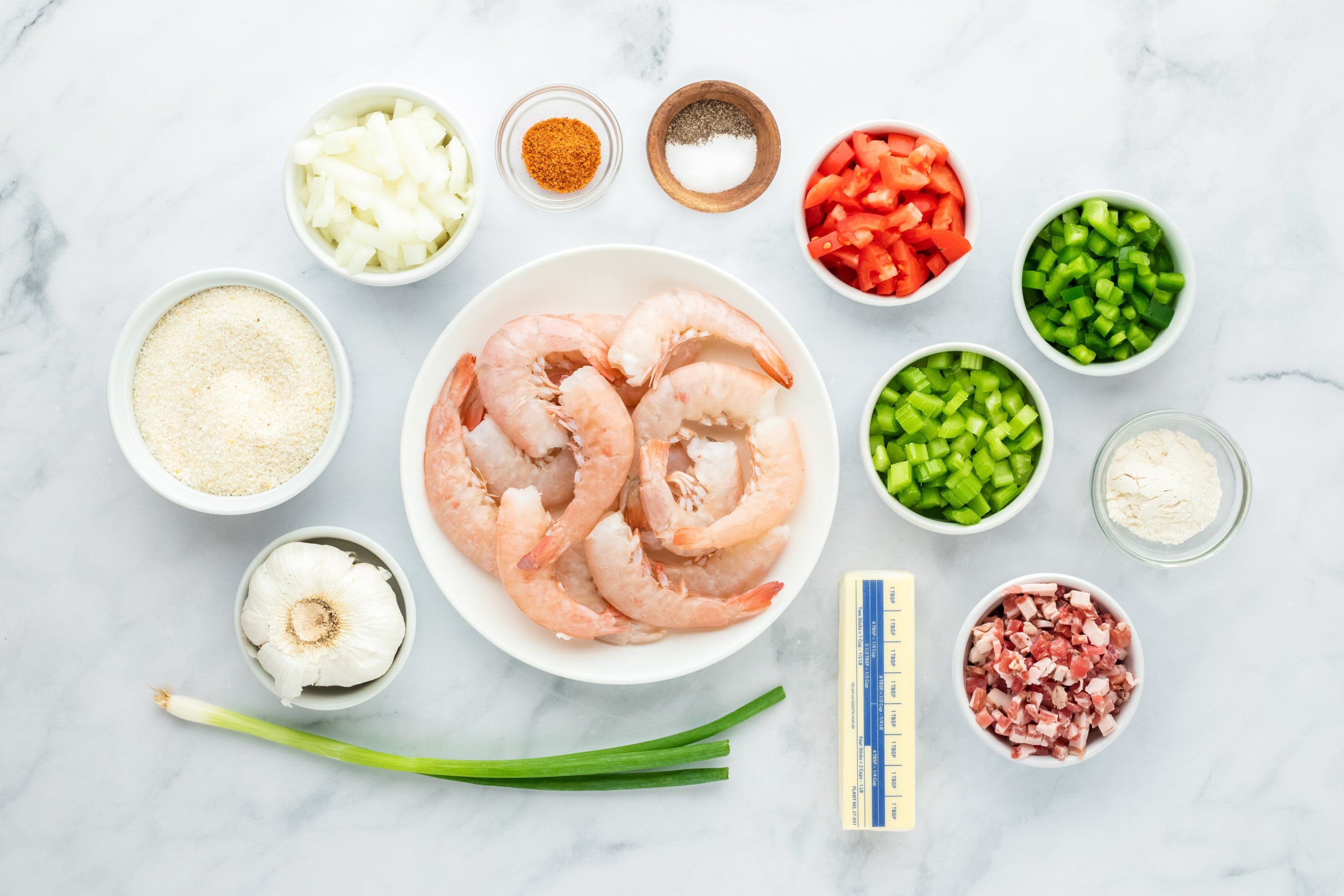 Ingredients to make a classic shrimp and grits recipe