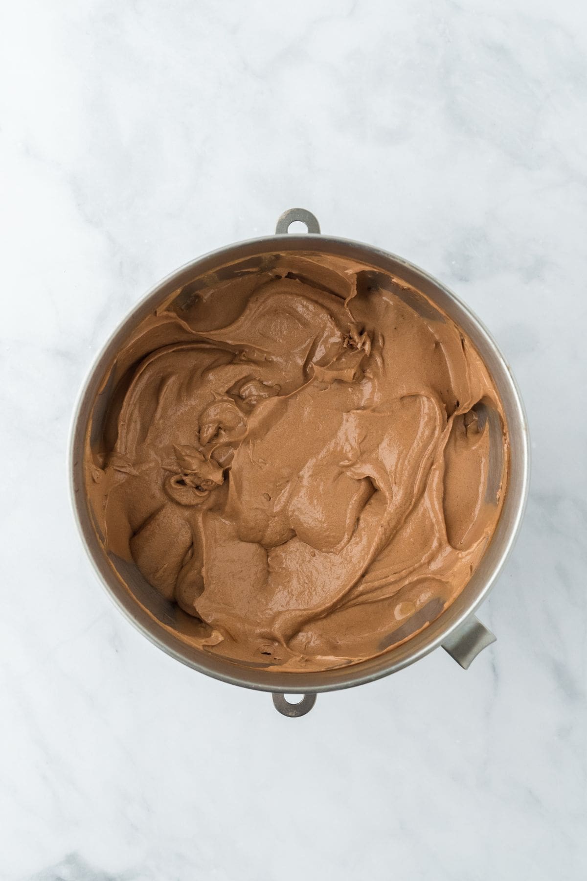 Smooth, creamy chocolate pound cake batter in a mixing bowl