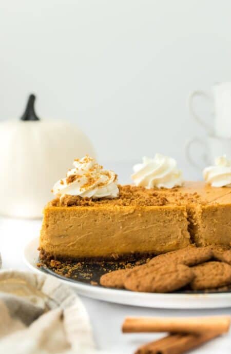 Pumpkin cheesecake ready to enjoy with whipped cream on top