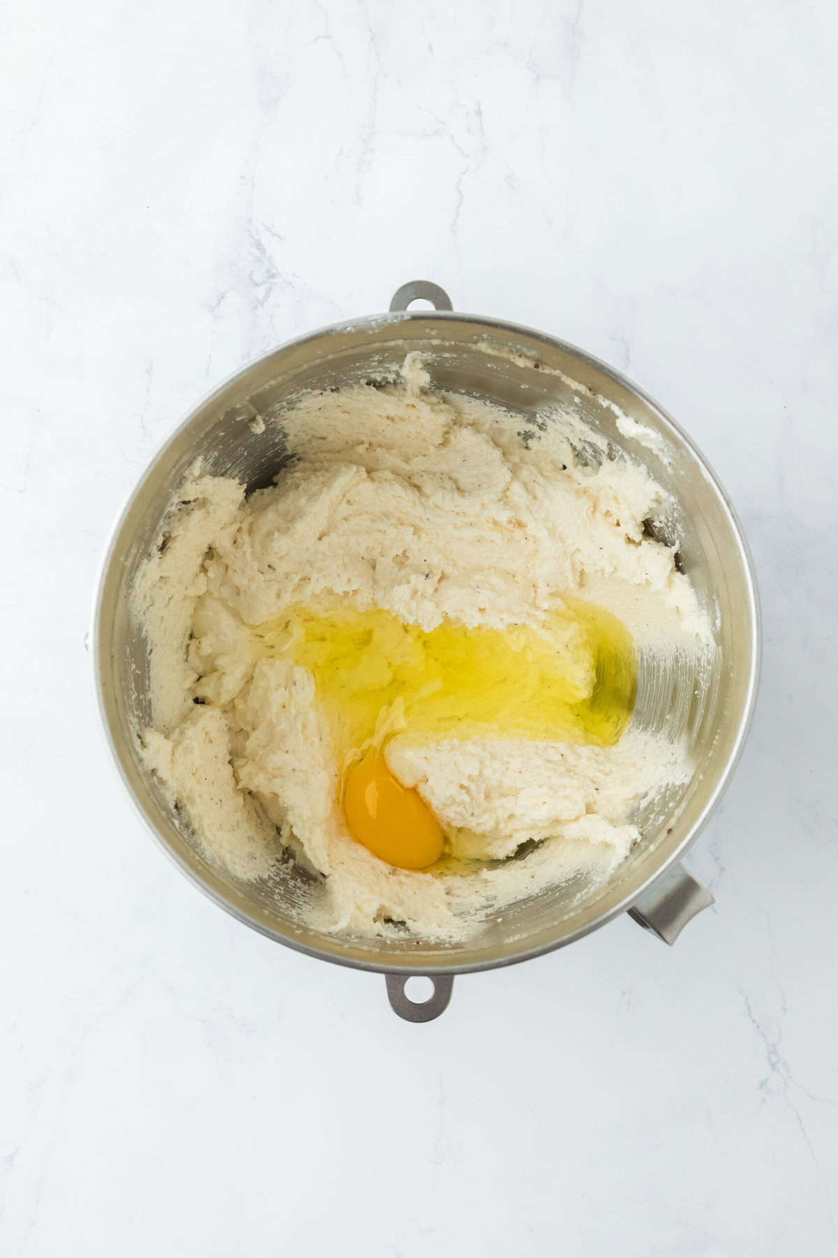 Creamed butter and sugar with a raw egg on top