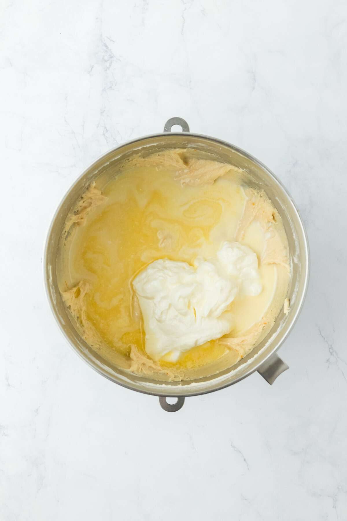 Sour cream and orange juice added to stand mixer bowl