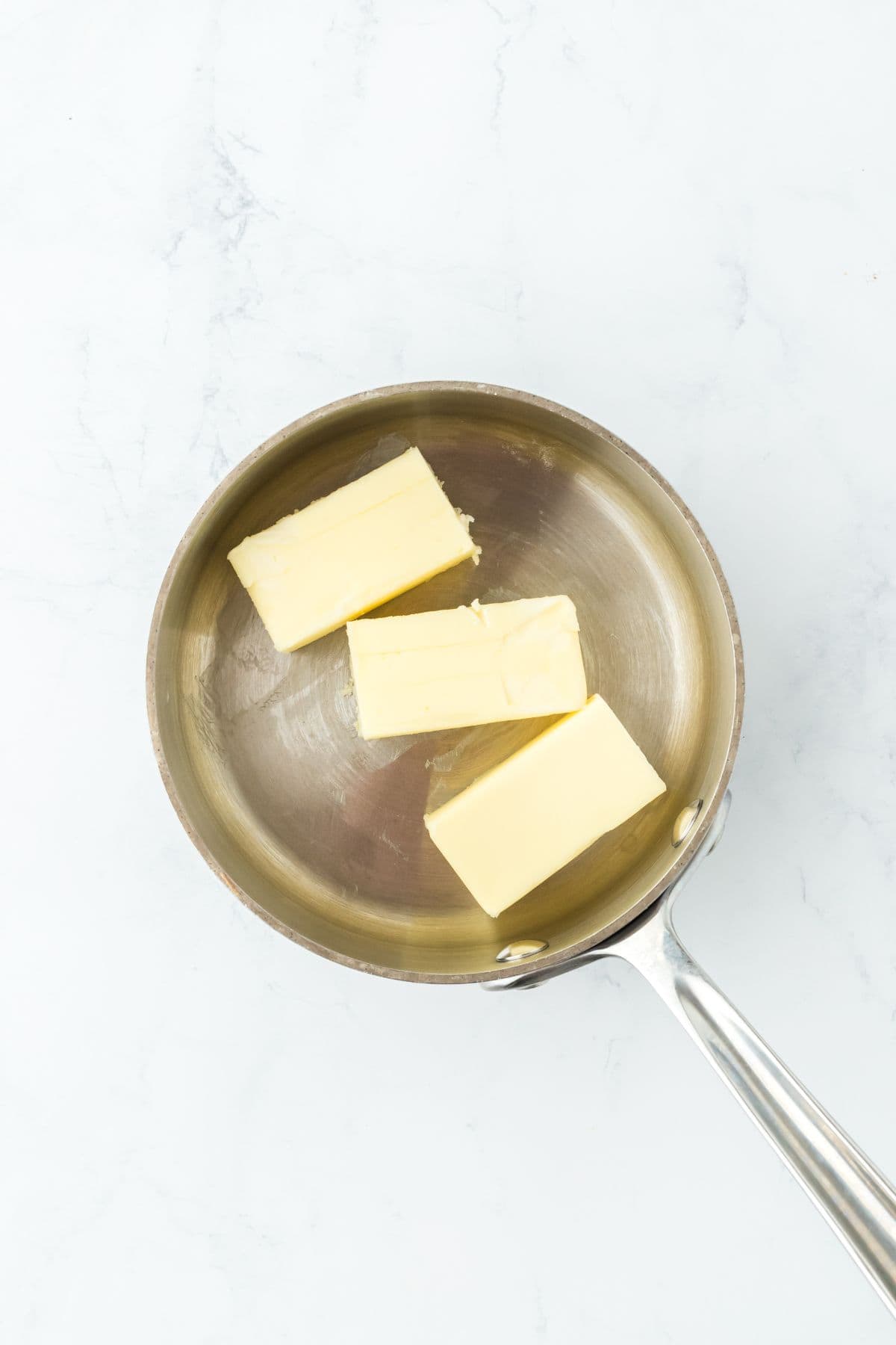 Saucepan with melting butter for the cookie recipe