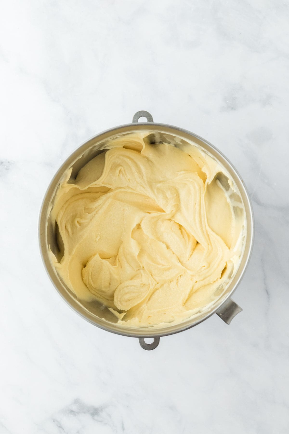 Smooth, creamy cake batter in a mixing bowl